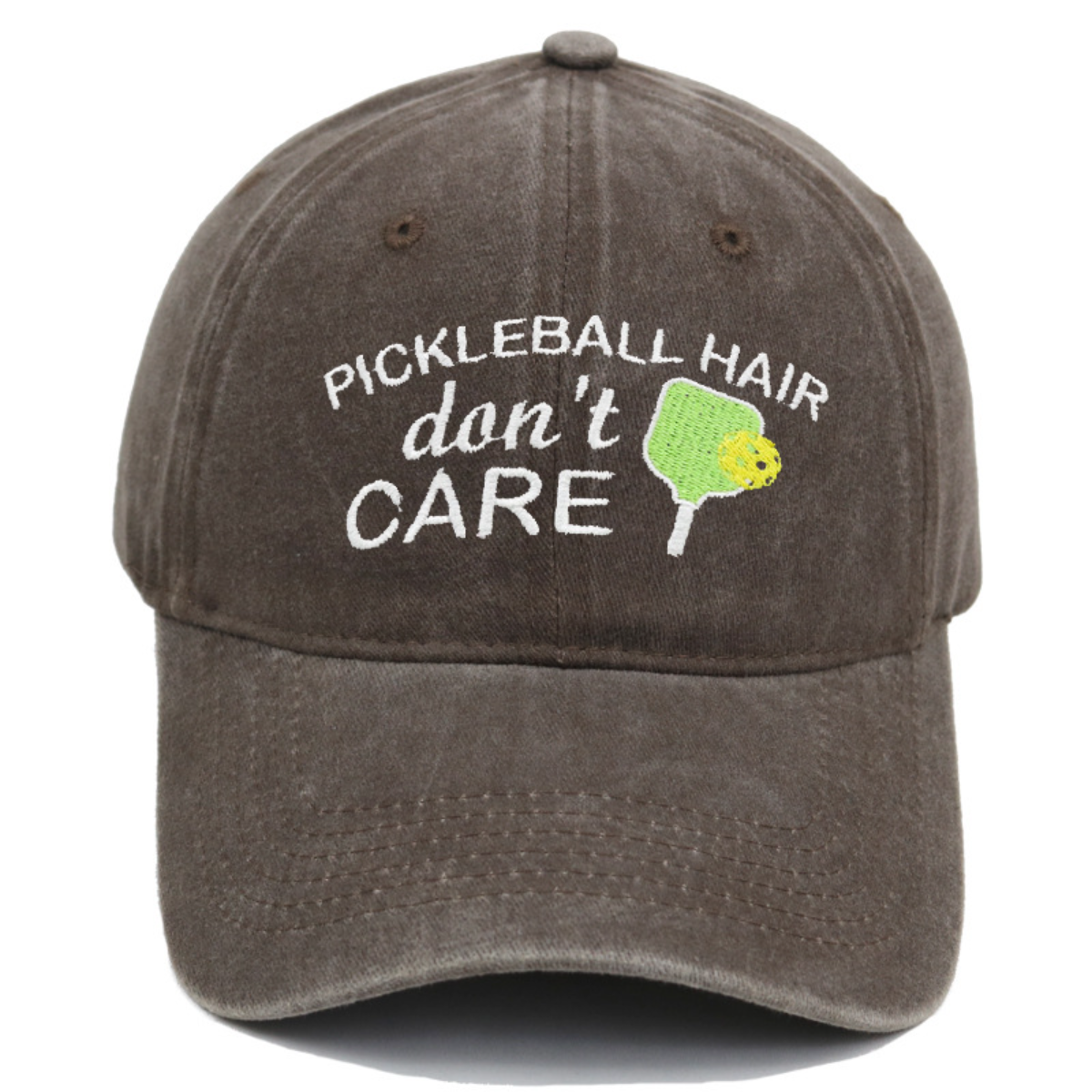 Brown cap with 'Pickleball Hair don't Care' text and pickleball graphic on a white background