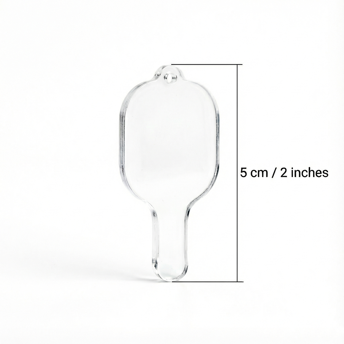 Clear glass ice cream scoop with dimensions on a white background